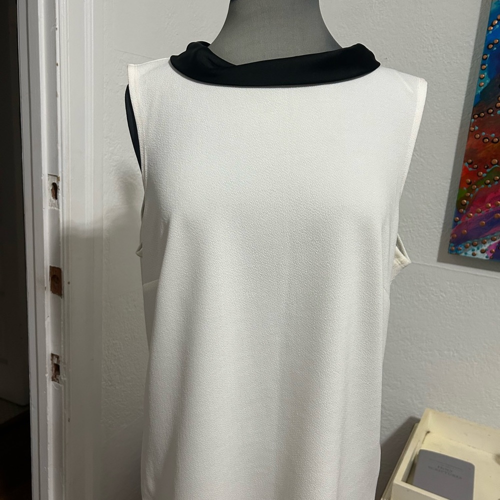 Sleeveless White Dress with Black Collar